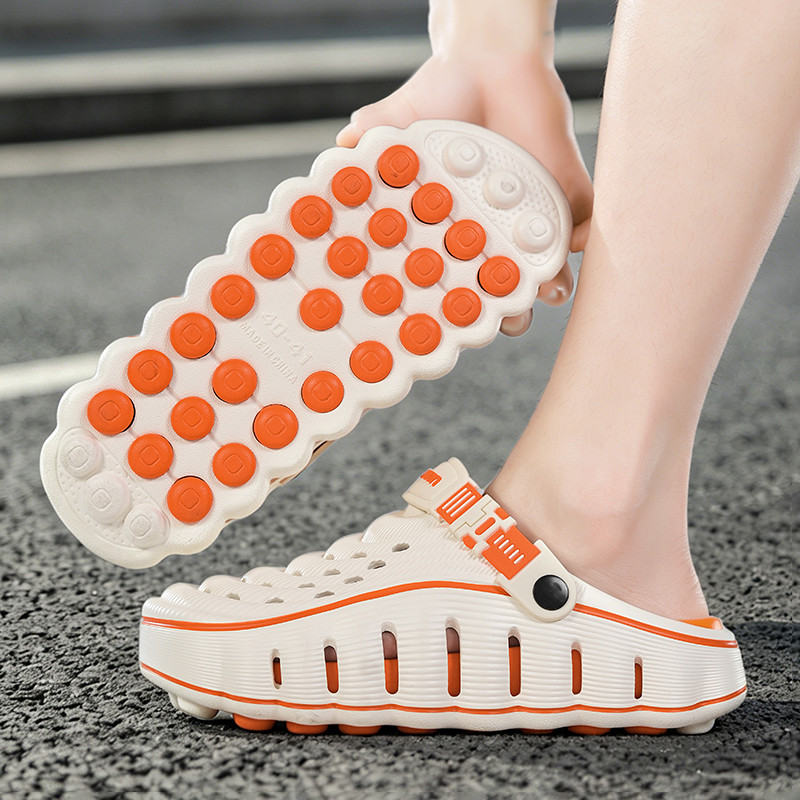 Massaging studded outsole